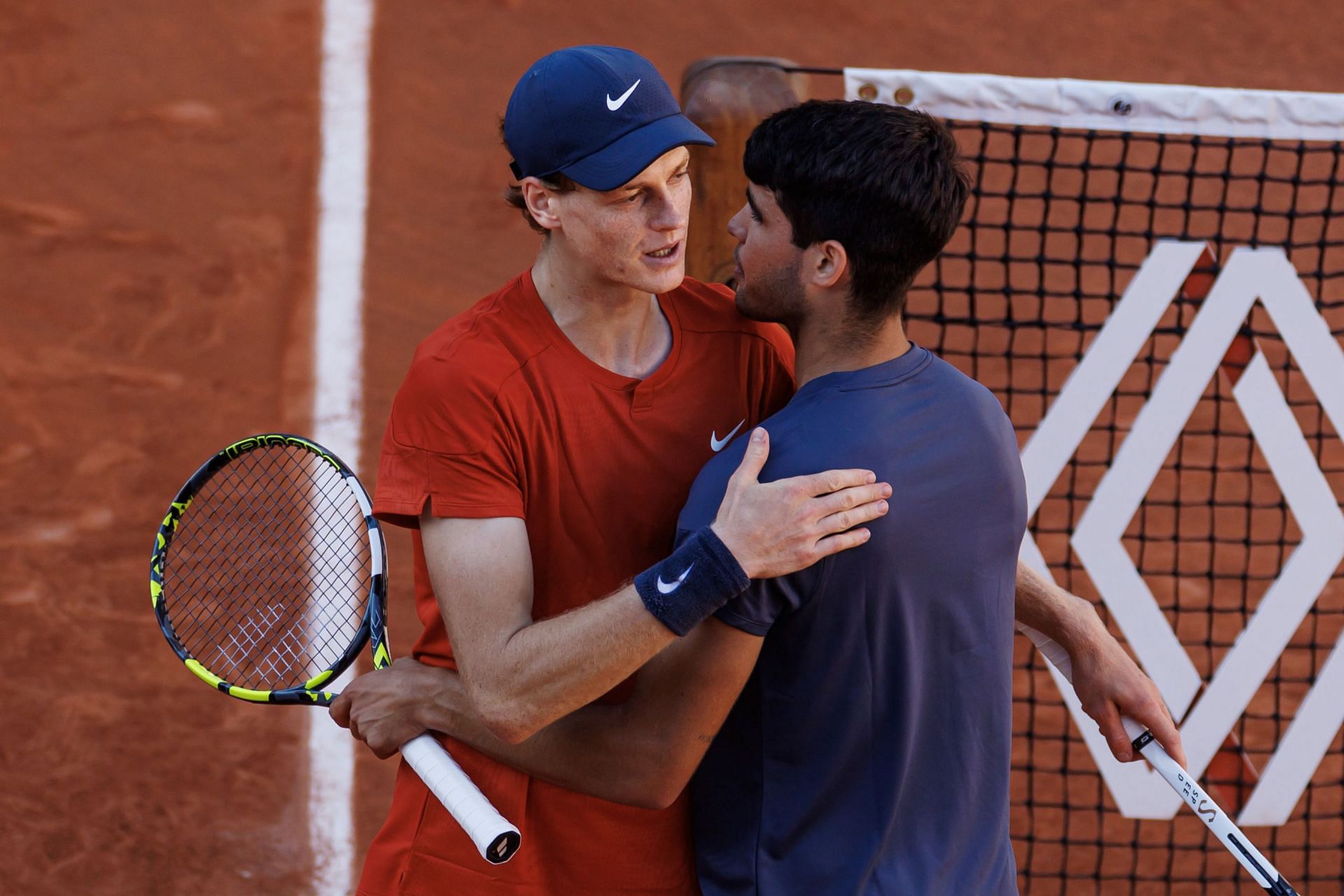 Carlos Alcaraz (R) and Jannik Sinner at the 2024 French Open (Image: Getty)